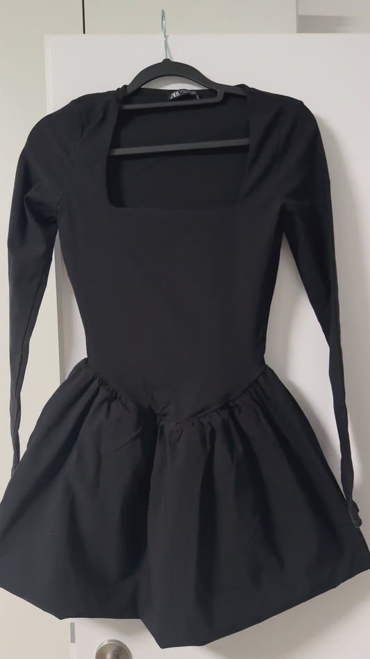 Black Dress with Flared Skirt